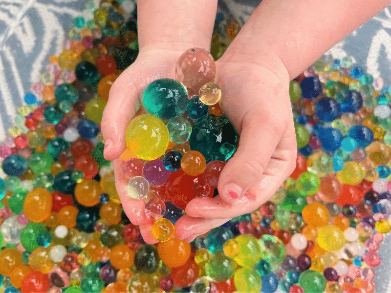 Child with Water Beads